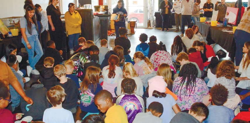 Young readers gathered for a book-related creative activity